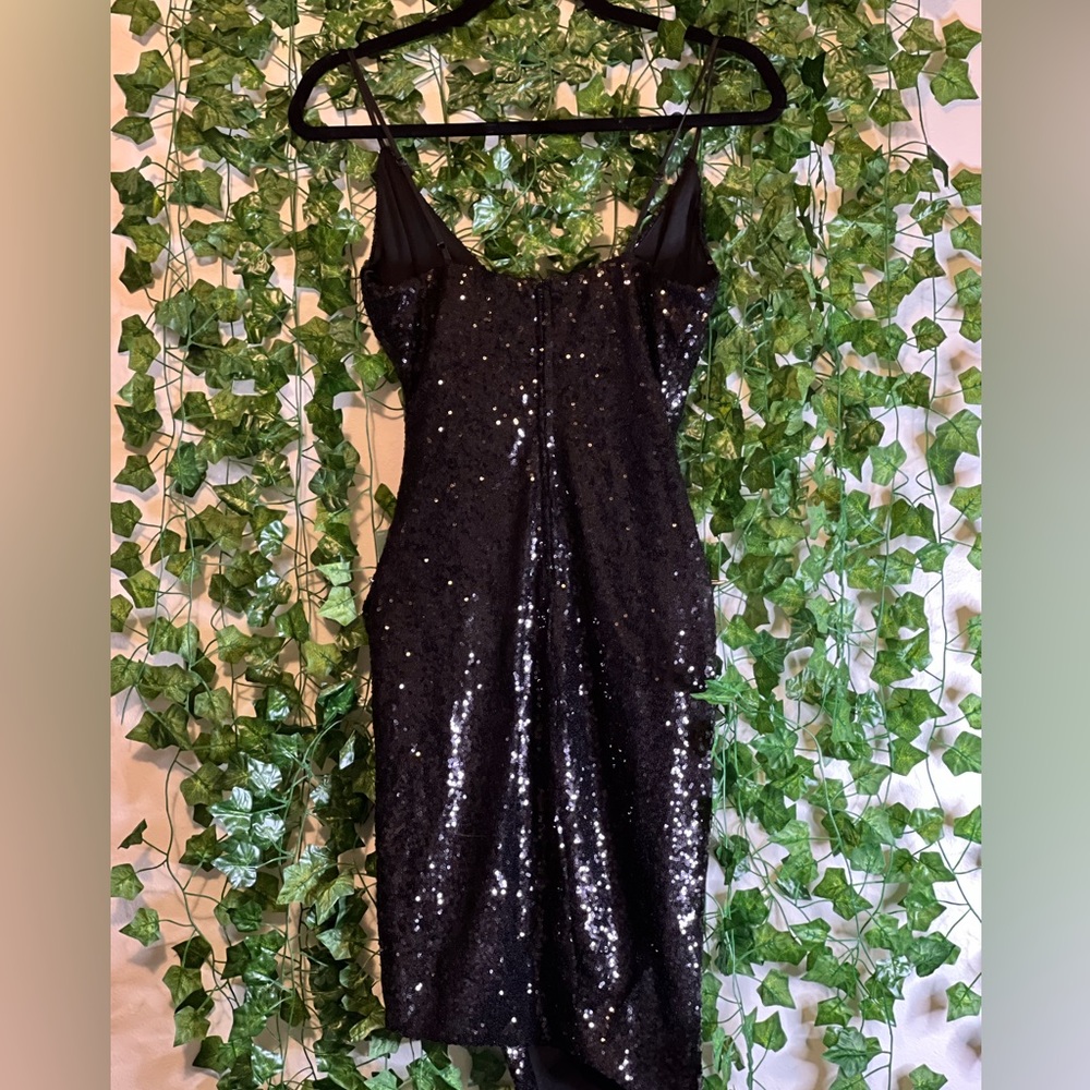 Black sequence dress great for homecoming or a night out with the girls.